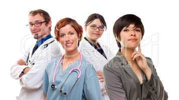 Young Mixed Race Woman with Doctors and Nurses Behind