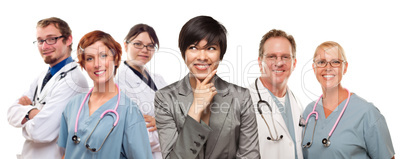 Young Mixed Race Woman with Doctors and Nurses Behind