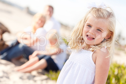 Adorable Little Blonde Girl Having Fun At the Beach