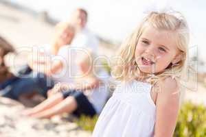 Adorable Little Blonde Girl Having Fun At the Beach