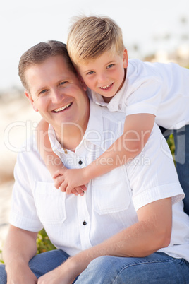 Cute Son with His Handsome Dad Portrait Outside