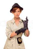 Female Detective With Badge and Gloves In Trench Coat on White