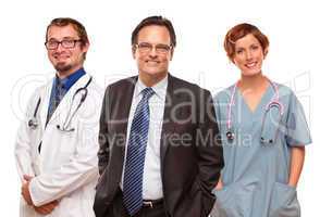 Smiling Businessman with Doctors and Nurses