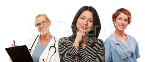 Hispanic Woman with Female Doctors and Nurses