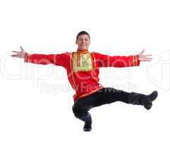 Happy man in russian costume performing dance