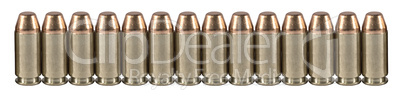 Bullets in a line isolated on white