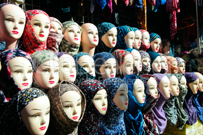 Closeup of the heads of a mannequin in hijab