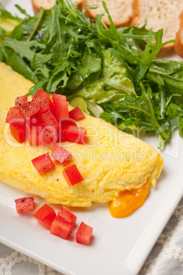 cheese ometette with tomato and salad