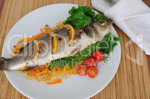 baked trout on onion-carrot cushion