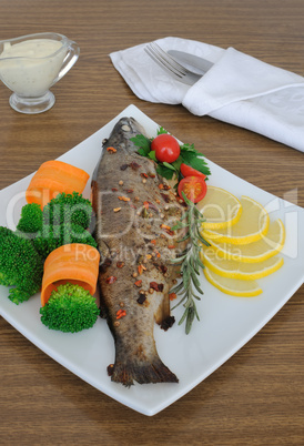 baked sea bass with broccoli and carrots