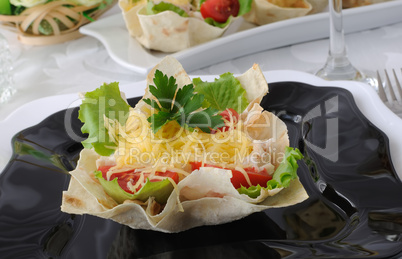basket, stuffed with chicken, tomatoes and cheese