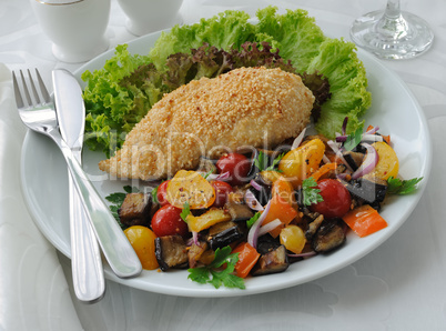 chicken schnitzel with vegetables in sesame