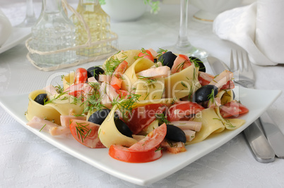 pasta salad with ham, tomato and olives