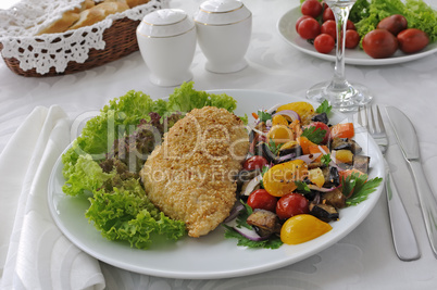 chicken schnitzel with vegetables in sesame