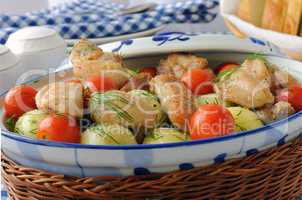 baked potatoes with chicken and tomato