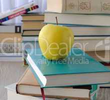 apple on stack of books