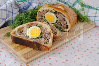 Meatloaf with egg and greens in the test