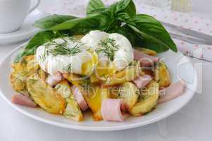 Fried potatoes with dill and ham with eggs Benedict