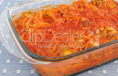 Baked fish in tomato sauce with vegetables