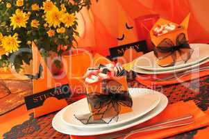 Festive table with gifts for Halloween