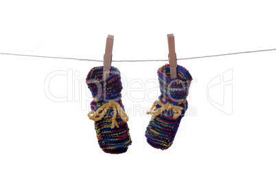 baby socks drying on line