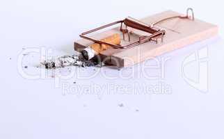 cigarette on mousetrap