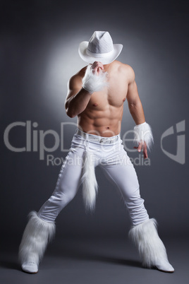 Sexy dancer in white cowboy costume