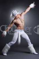 Sexy dancer in cowboy costume