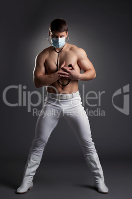 Sexy dancer in white doctor costume