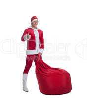 Happy young santa claus with huge red bag