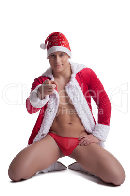 Sexy dancer in red christmas costume isolated