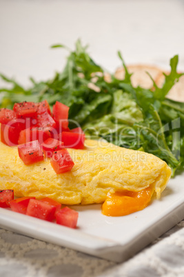 cheese ometette with tomato and salad