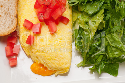 cheese ometette with tomato and salad