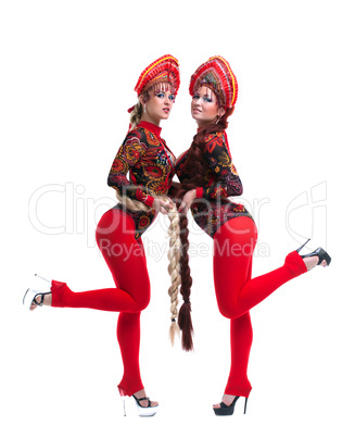 Two russian go-go girls with long braids