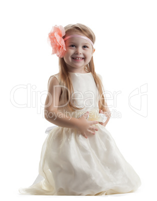 Happy little girl in long dress