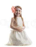 Happy little girl in long dress