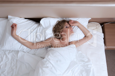Beauty young woman relax bed in morning room