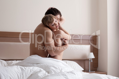 Young beauty Couple making morning sex in bedroom