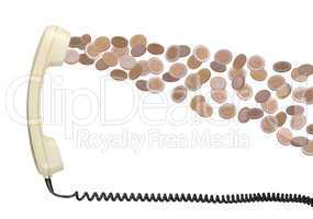 old telephone headset with coins
