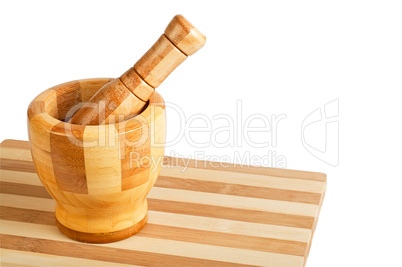 Mortar and pestle on a cutting board