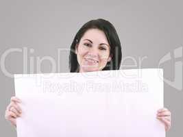 Beautiful woman with a banner smiling