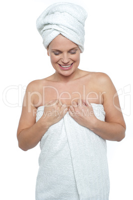 Portrait of charming young lady in bathrobe