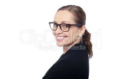 Side profile of a woman wearing spectacles