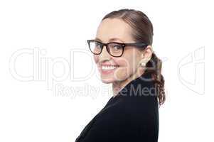 Side profile of a woman wearing spectacles