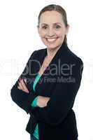 Middle aged woman posing against white background