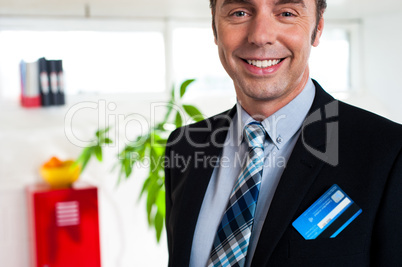 Entrepreneur with credit card in his blazer pocket