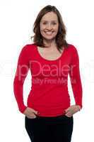 Middle aged woman in bright red top