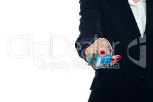 Cropped image of a woman holding credit card