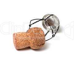 Champagne wine cork and muselet on white background