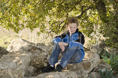 Youngster resting in nature